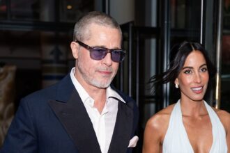 brad pitts girlfriend ines de ramon dons risque bridal inspired ensemble at glitzy f1 premiere 6850cbee27566