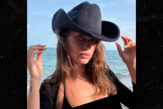 hailey bieber shares bikini photos as justin shares cryptic ig post about love 6845f9a0f0e4d