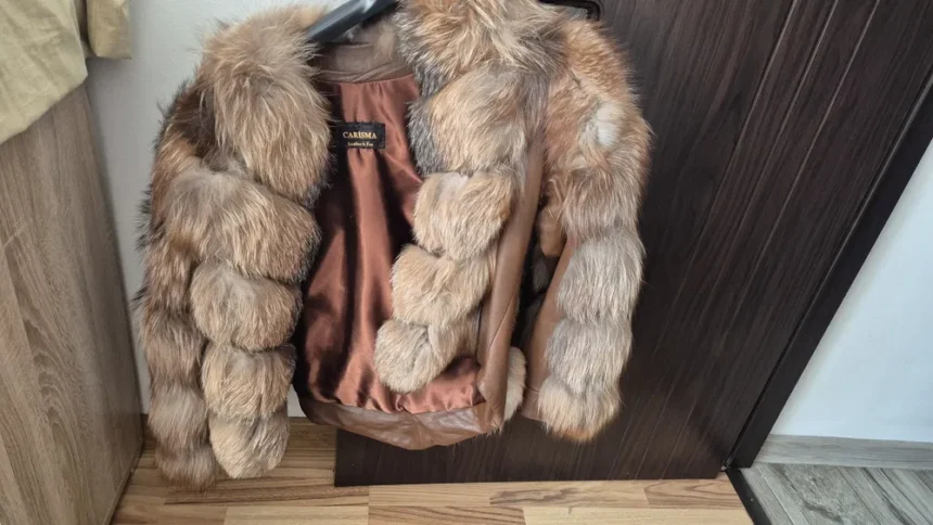 o femeie a ramas fara bani dupa ce a incercat sa vanda un palton pe olx 686b77cddf6ea